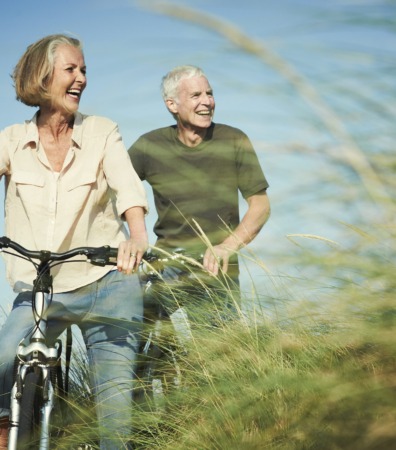 Senior couple enjoying day out on their bicycles