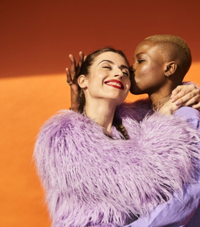Colourful studio portrait of two women